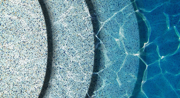 pool pebble / plaster installation on remodel