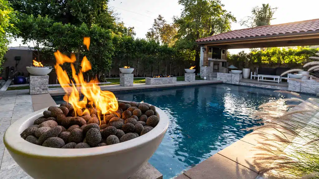 Custom residential swimming pool in florida with fire bowl