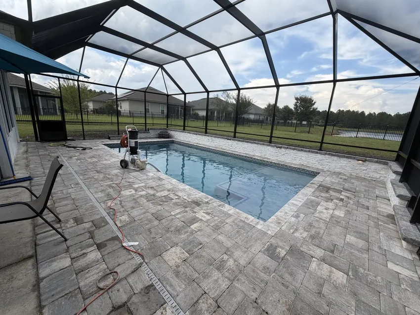 Screened paver pool built by Scott's Pools in Jacksonville