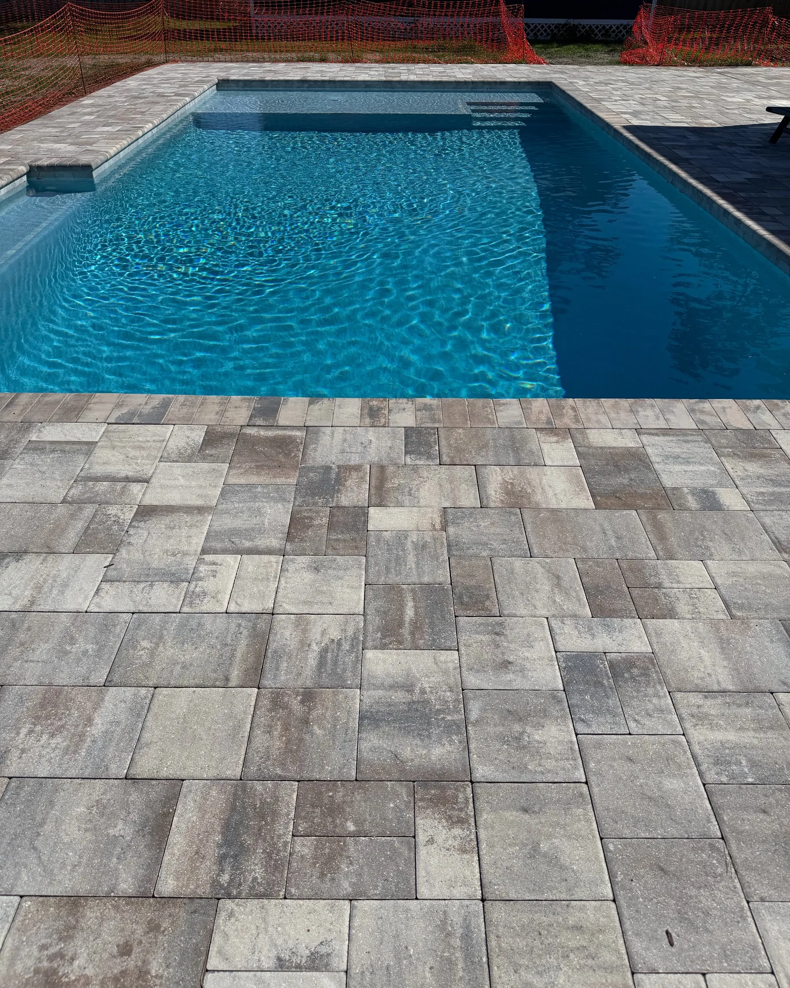 Custom pool with paver deck built by Scott's Pools & Spas in Jacksonville